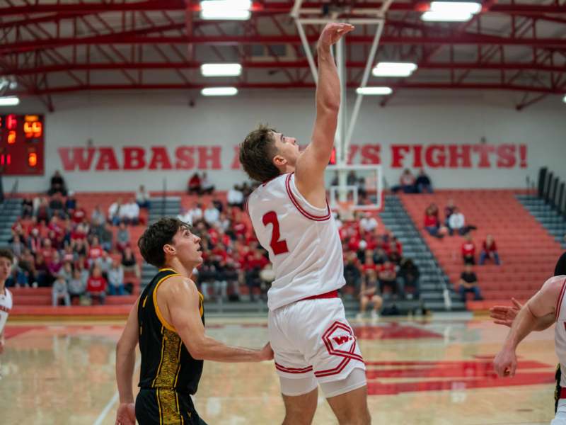 a basketball player in a red uniform