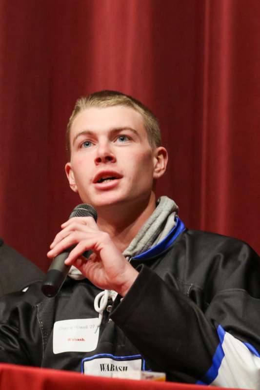 a man speaking into a microphone