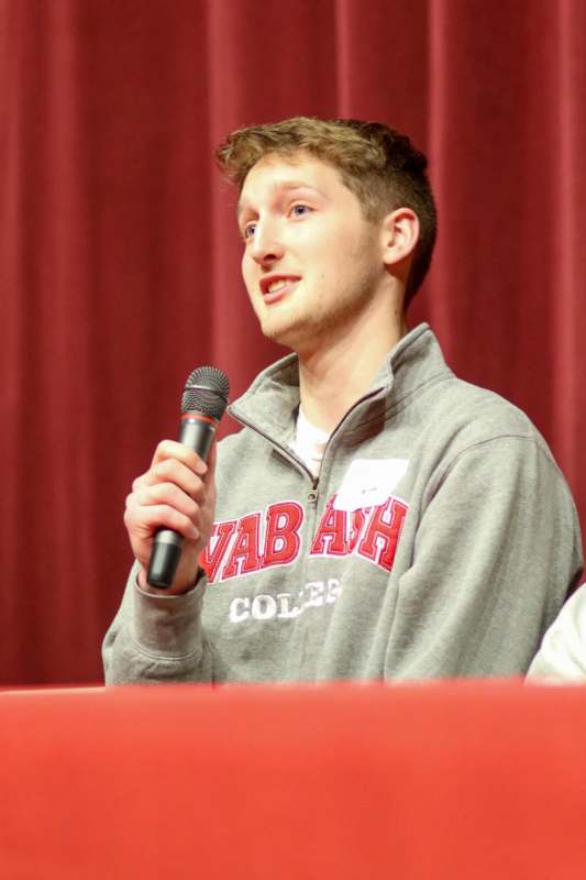 a man speaking into a microphone