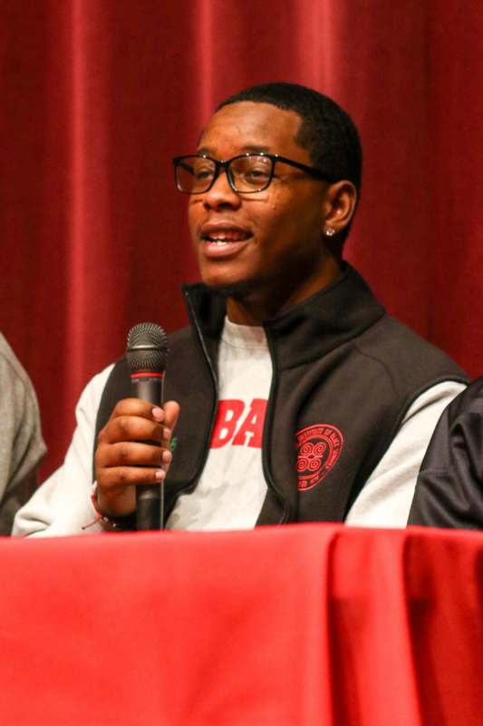 a man holding a microphone