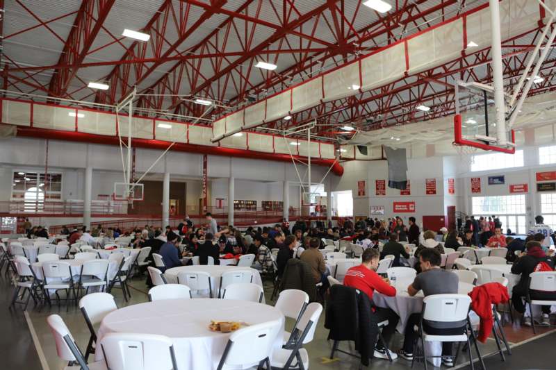 a large room with tables and chairs