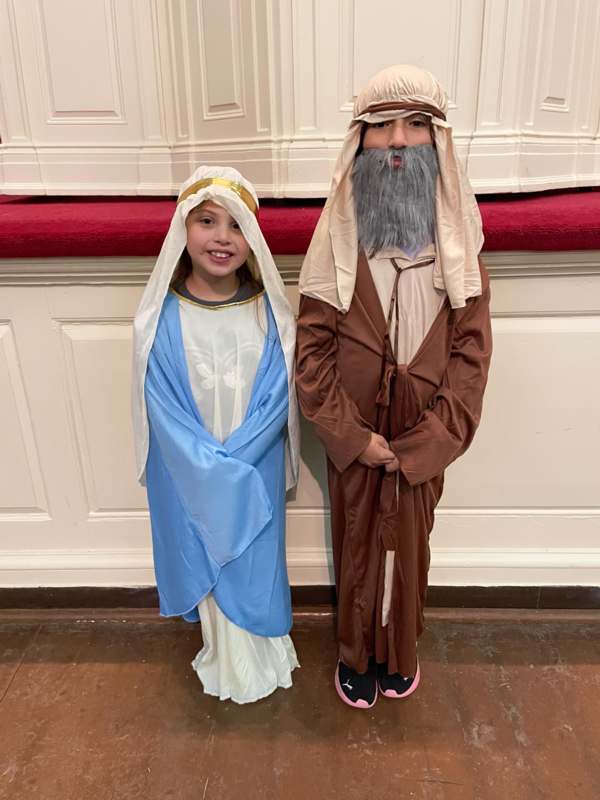 a girl and a boy in clothing