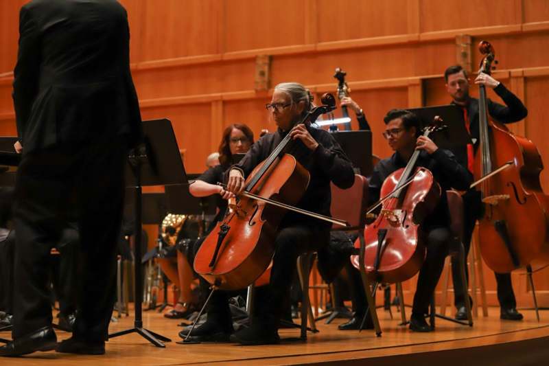 a group of people playing instruments