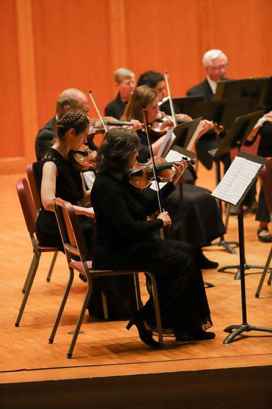 a group of people playing instruments