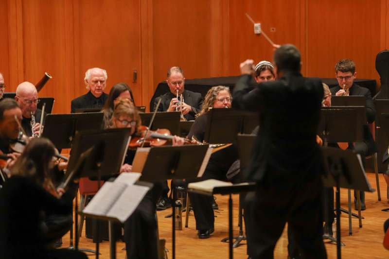 a group of people playing instruments