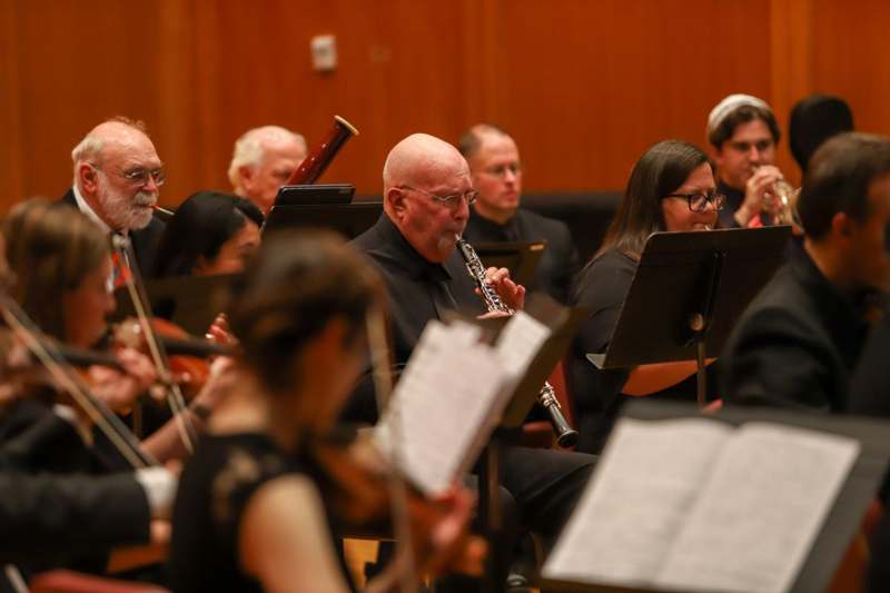 a group of people playing instruments