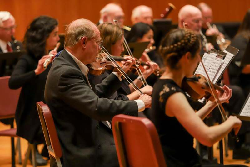 a group of people playing instruments