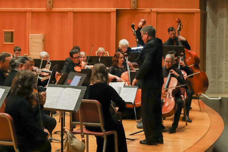 a group of people playing instruments