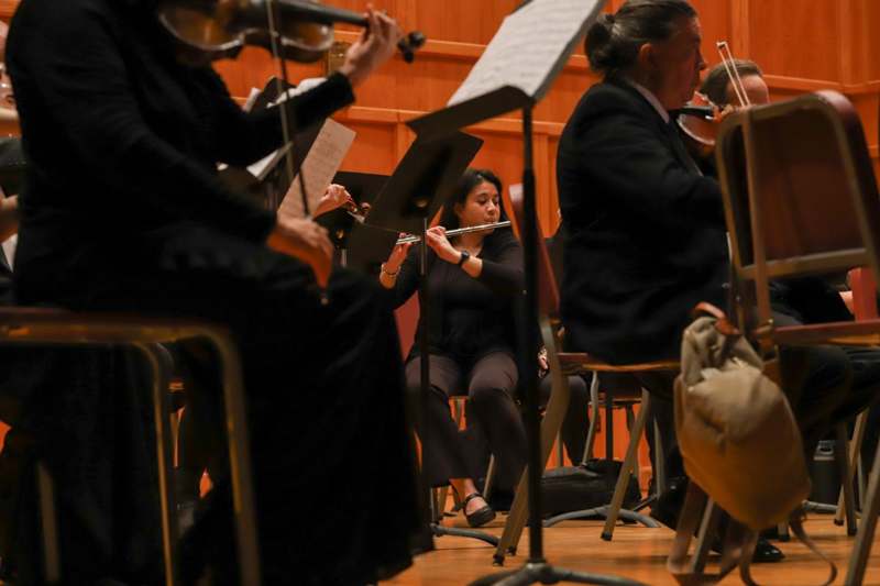 a group of people playing instruments