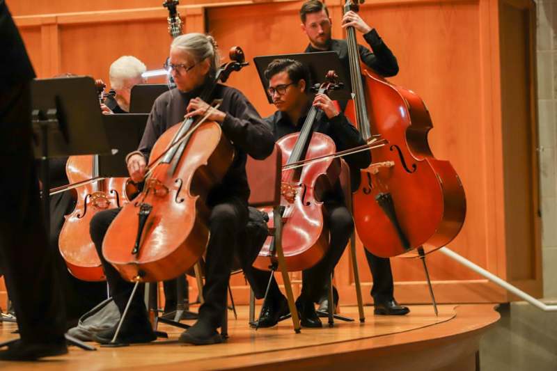 a group of people playing instruments