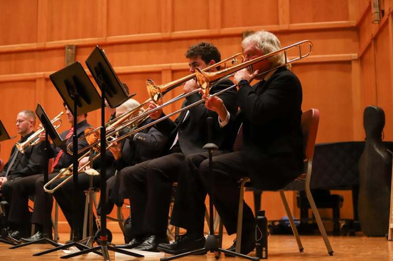 a group of people playing instruments