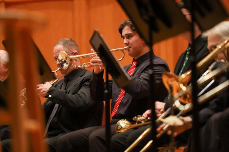 a group of people playing instruments