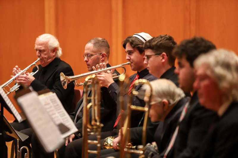 a group of people playing instruments