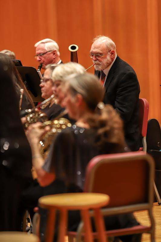 a group of people playing instruments