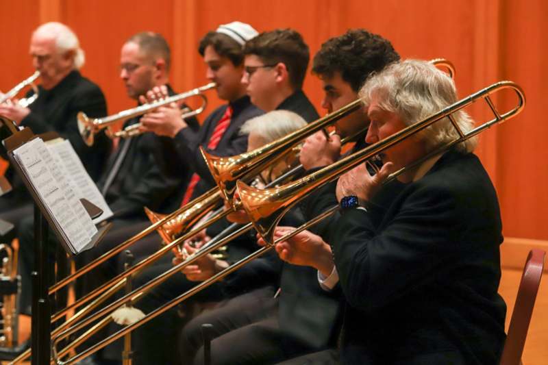 a group of people playing instruments