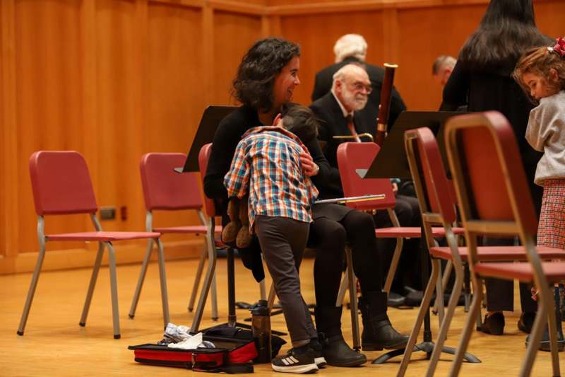 a woman holding a child