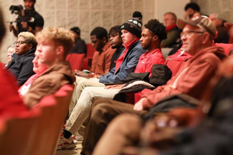 a group of people sitting in a room
