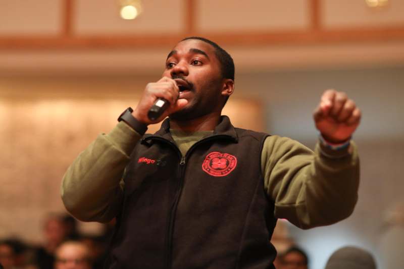 a man speaking into a microphone