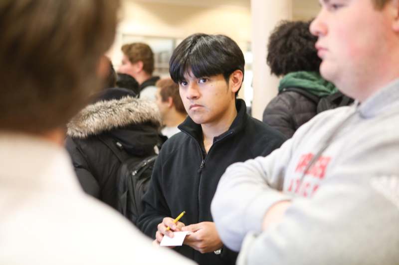 a man in a black jacket