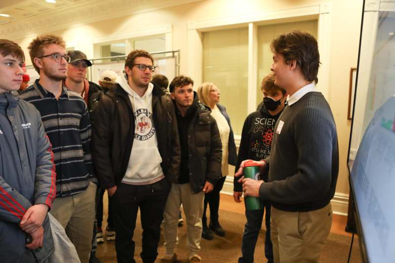 a group of people standing in a room
