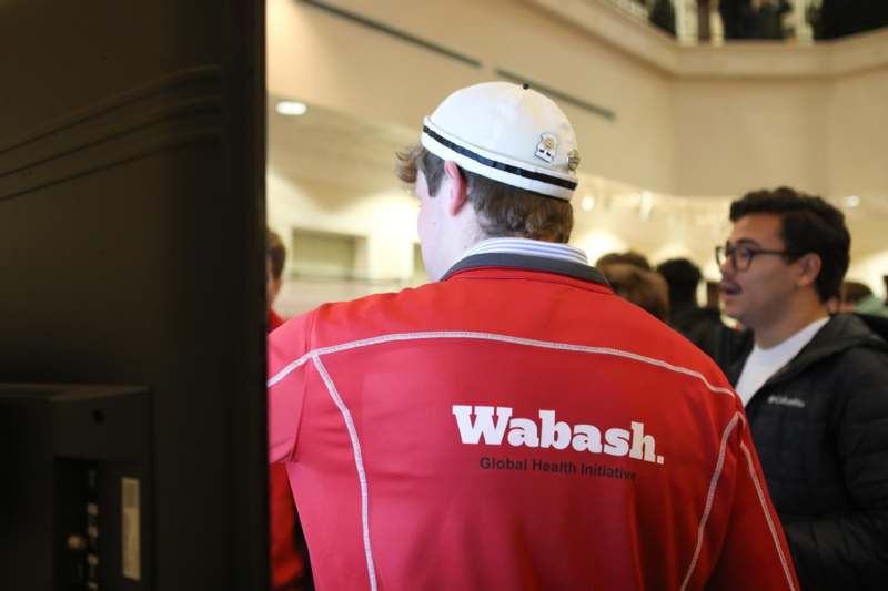 a man wearing a red jacket