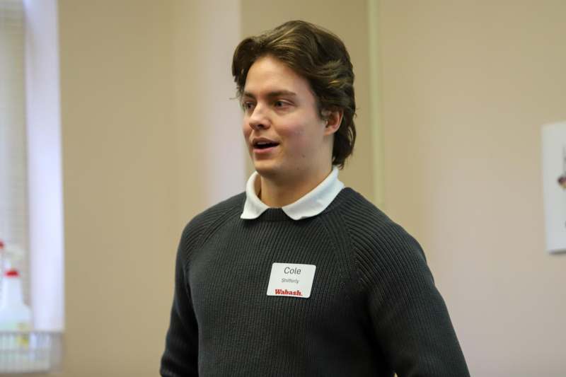 a man wearing a name tag