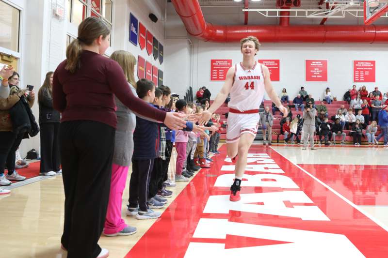 a man running in a gym