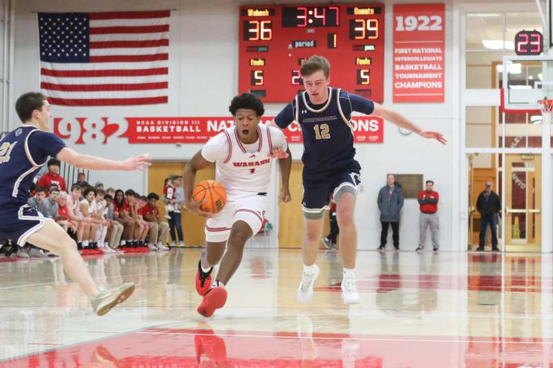a group of people playing basketball