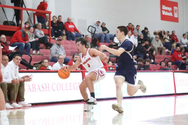 a group of people playing basketball