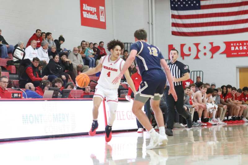 a group of people playing basketball