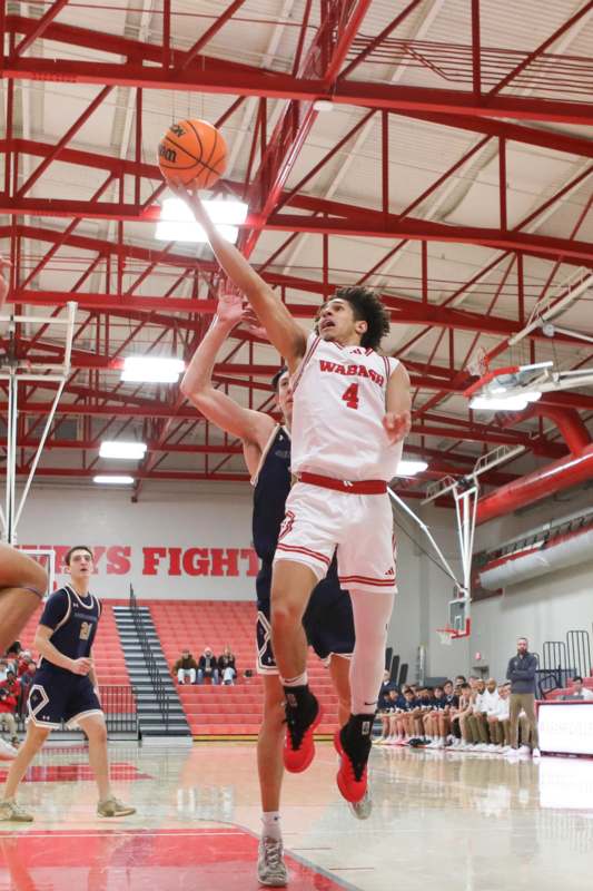 a basketball player in a gym