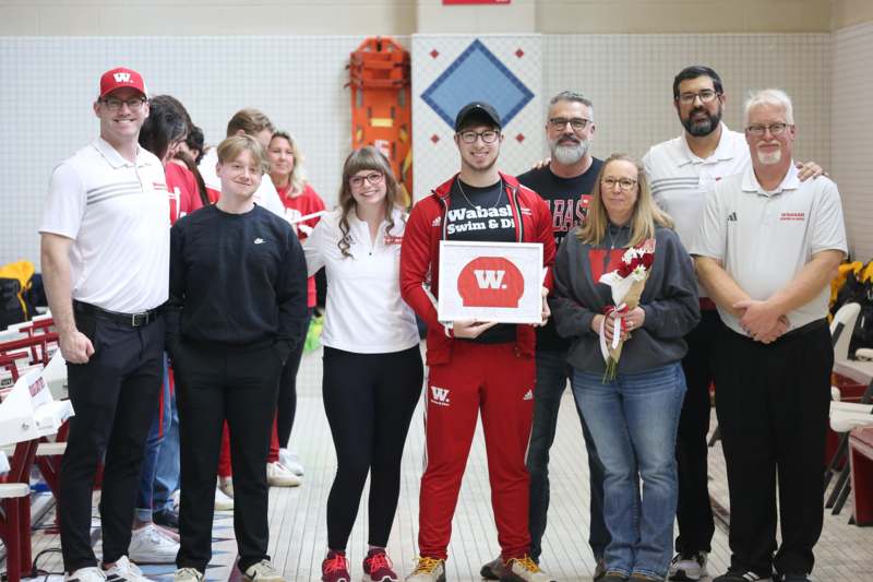 a group of people posing for a photo