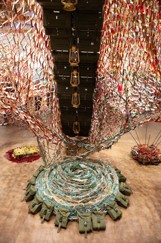 a large object with ribbons around it