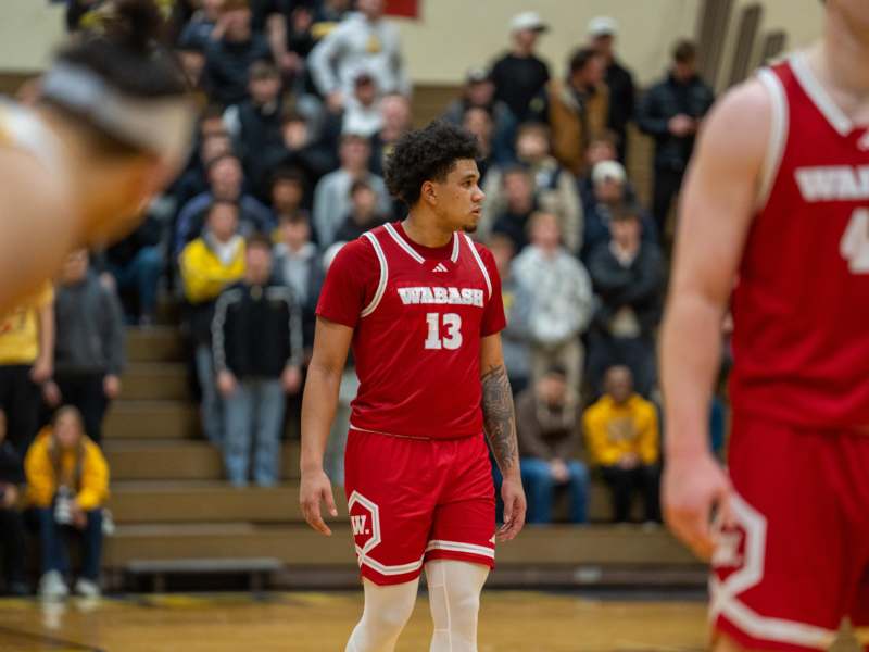a basketball player in red uniform