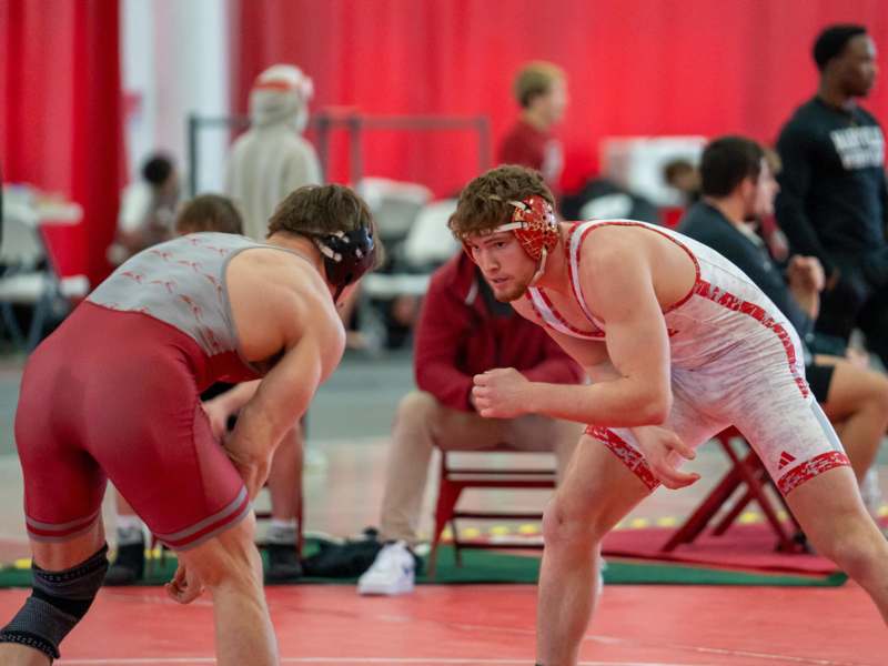 a group of men in wrestling gear