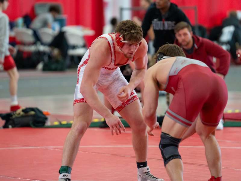 a group of men wrestling