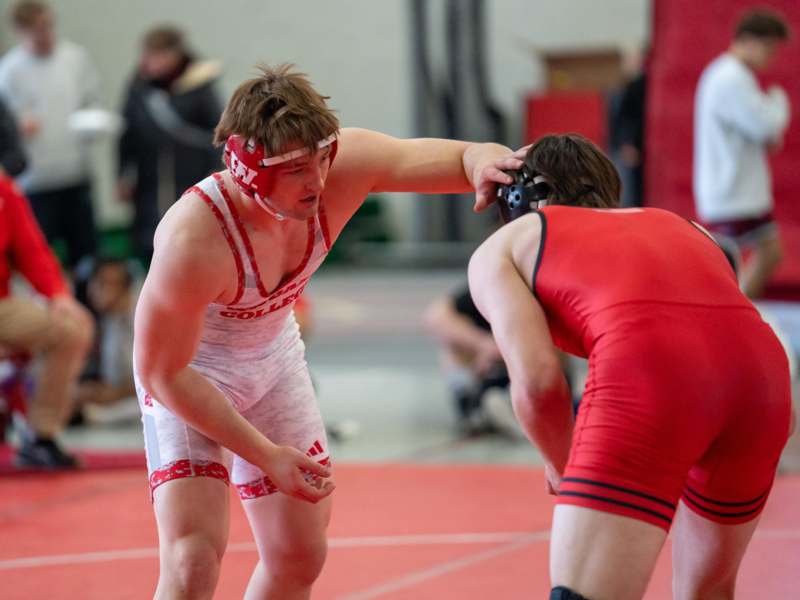 a group of men wrestling