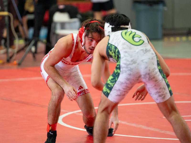 a group of men wrestling
