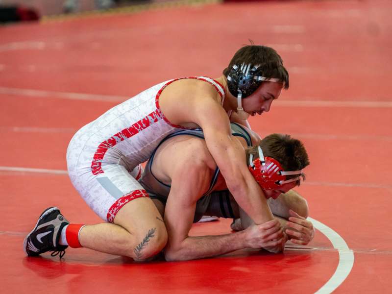 a group of men wrestling