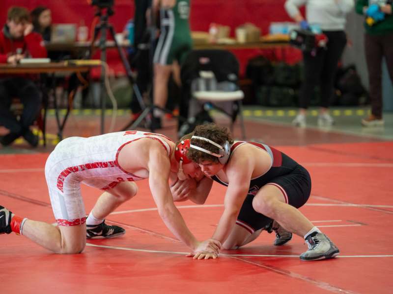 a group of men wrestling