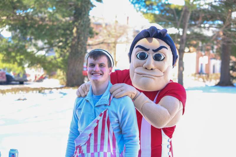 Basketball vs Wooster (2.07.26) - a man in a garment with a person in a apron