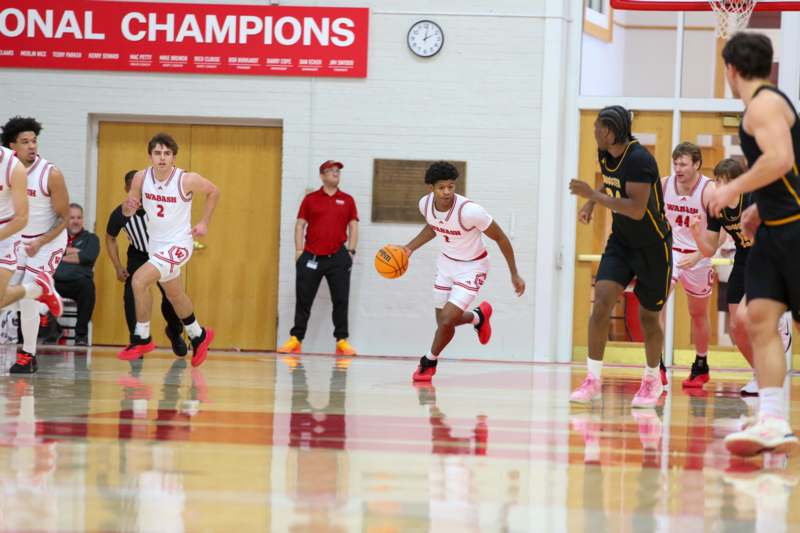 a group of men playing basketball
