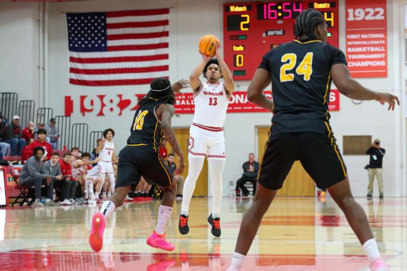 a group of people playing basketball