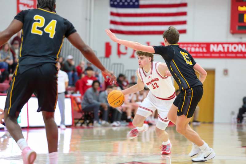 a group of people playing basketball