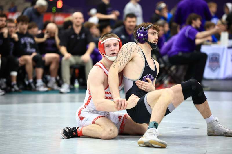 2026 NWCA National Duals - two men wrestling on the floor