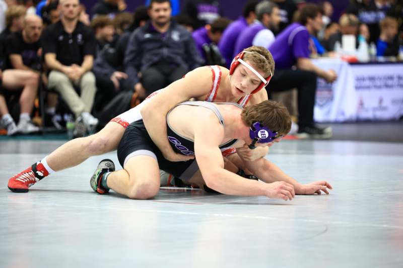a group of men wrestling