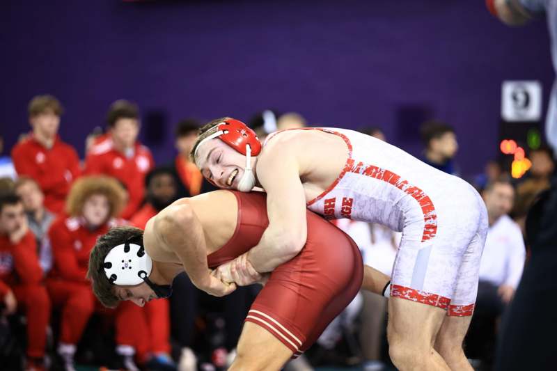 two men wrestling in a wrestling match