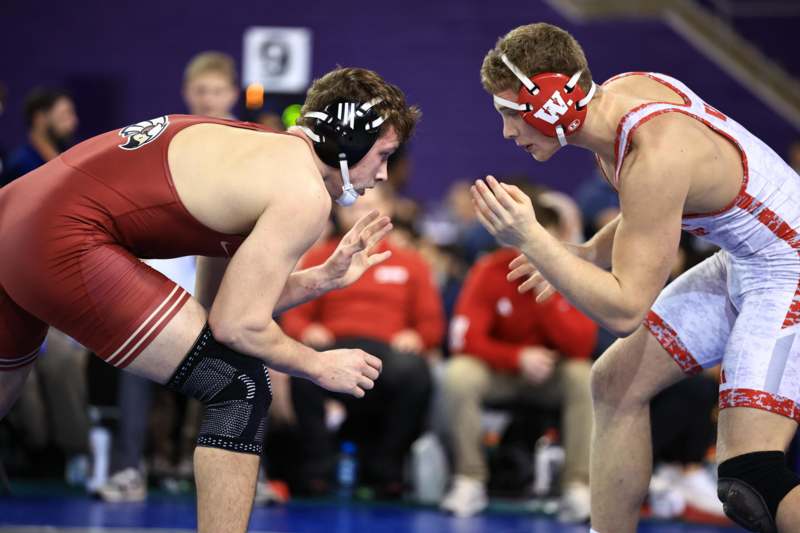 a group of men in wrestling gear