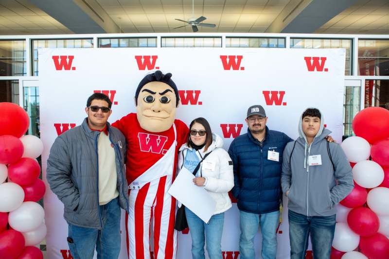 a group of people posing for a picture