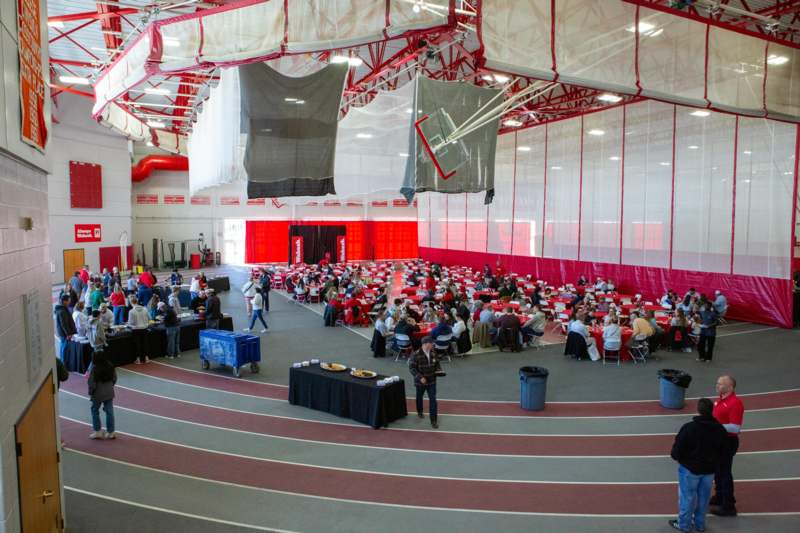 a large room with tables and chairs